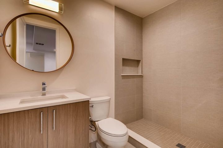 Lower Level Bathroom of a Caliber custom home at 1165 S Adams in Denver