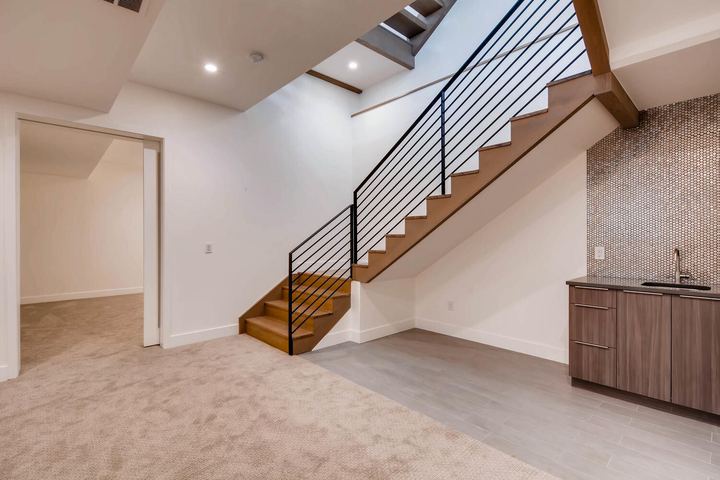 Lower Level Landing of a Caliber custom home at 1165 S Adams in Denver