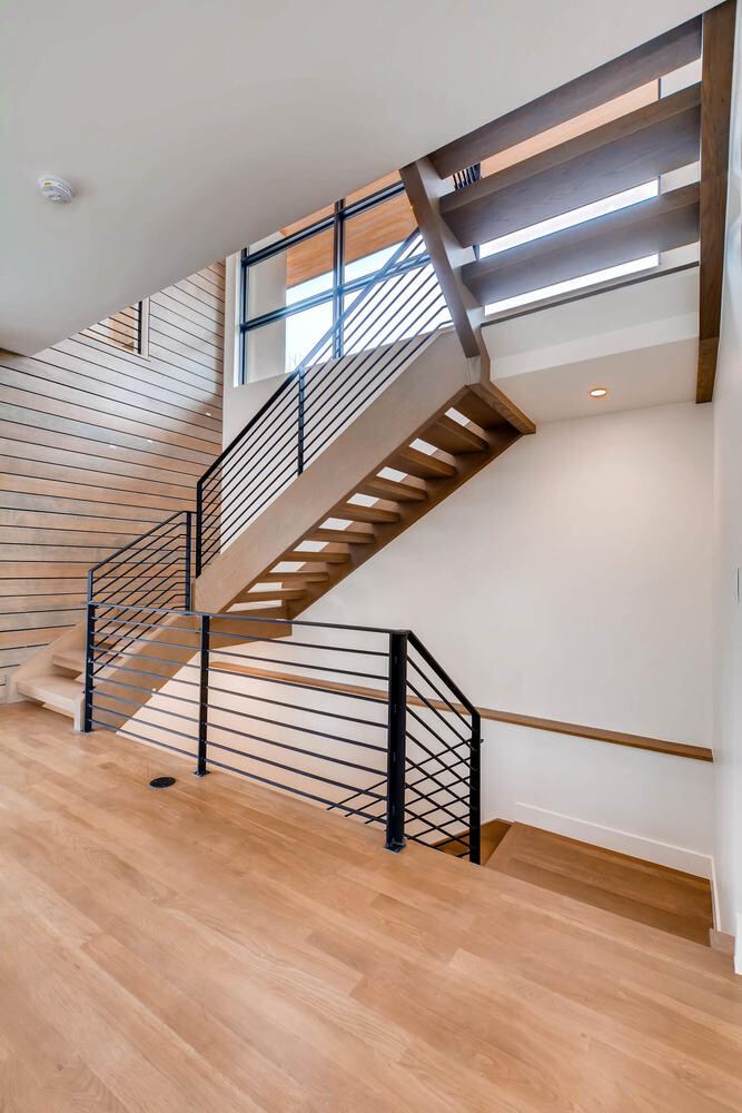 Stairway of a Caliber custom home at 1165 S Adams in Denver