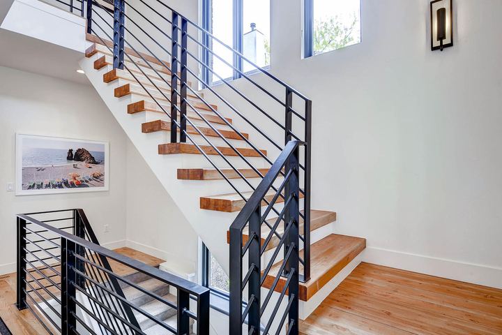 2nd Floor Stairway of a Caliber custom home at 1374 S Lafayette St in Denver