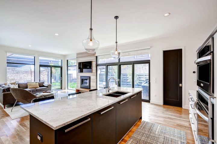 Kitchen of a Caliber custom home at 1374 S Lafayette St in Denver