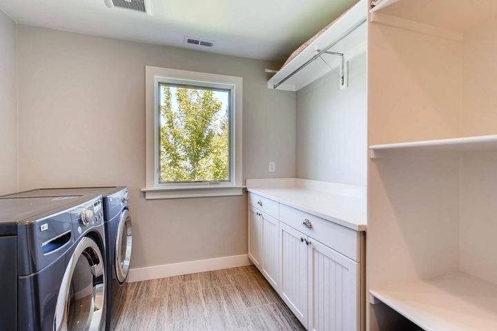 2nd Floor Laundry Room of a Caliber custom home at 1379 S Lafayette St in Denver