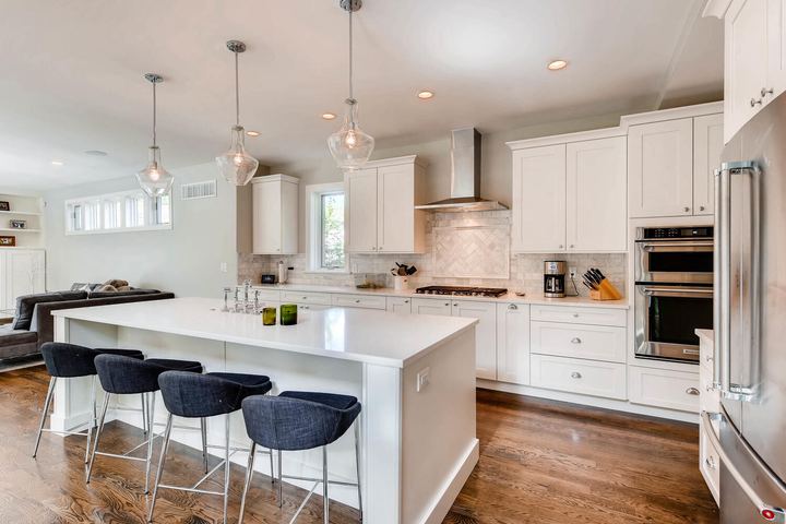 Kitchen of a Caliber custom home at 1379 S Lafayette St in Denver