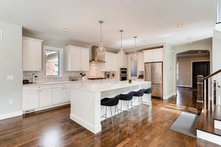 Kitchen of a Caliber custom home at 1379 S Lafayette St in Denver