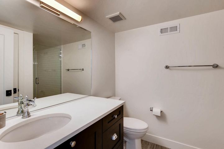 Lower Level Bathroom of a Caliber custom home at 1379 S Lafayette St in Denver
