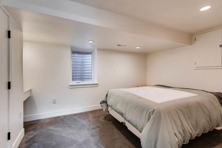 Lower Level Bedroom of a Caliber custom home at 1379 S Lafayette St in Denver