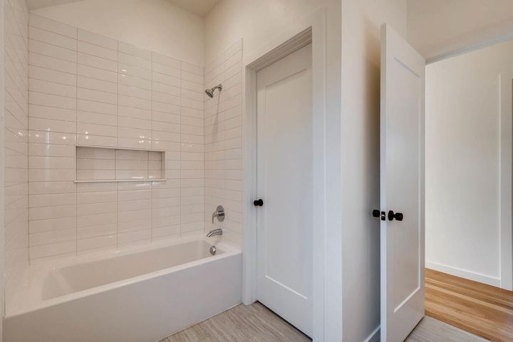 2nd Floor Bathroom of a Caliber custom home at 1442 S Clarkson St in Denver