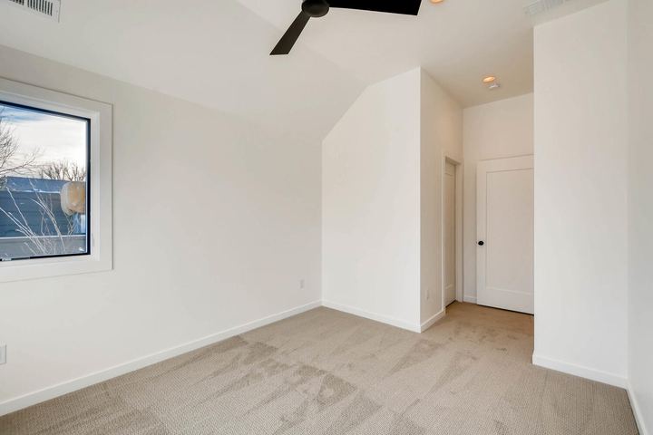 2nd Floor Bedroom of a Caliber custom home at 1442 S Clarkson St in Denver