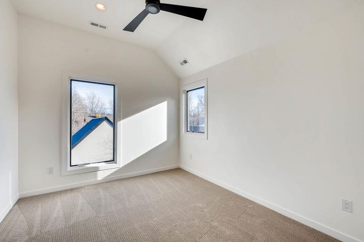 2nd Floor Bedroom of a Caliber custom home at 1442 S Clarkson St in Denver