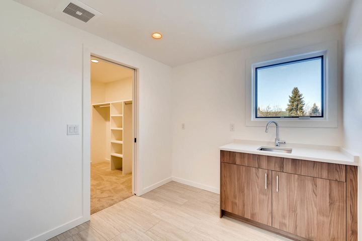 2nd Floor Laundry Room of a Caliber custom home at 1442 S Clarkson St in Denver