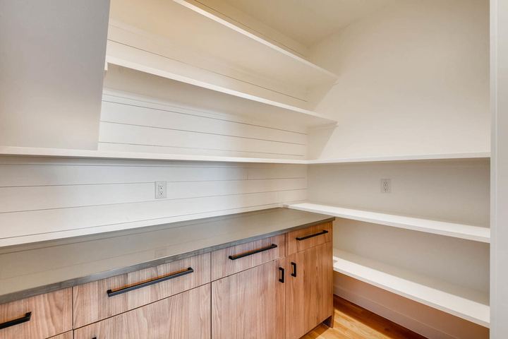 Butlers Pantry of a Caliber custom home at 1442 S Clarkson St in Denver