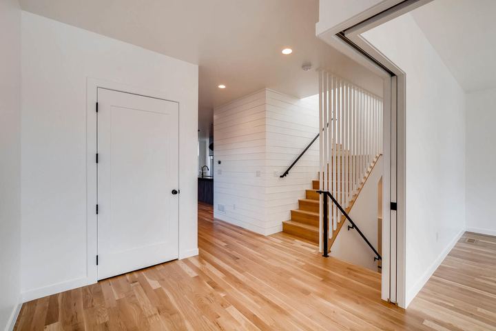 Foyer of a Caliber custom home at 1442 S Clarkson St in Denver