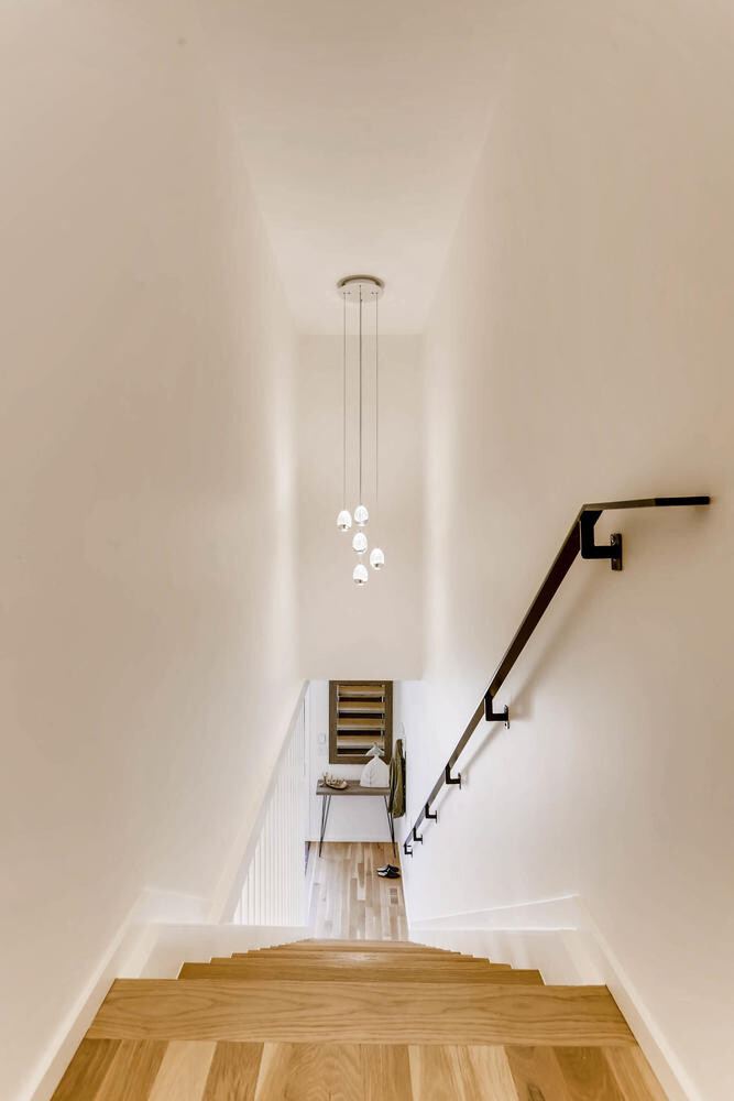 2nd Floor Stairway of a Caliber custom home at 1716 W 34th Ave in Denver
