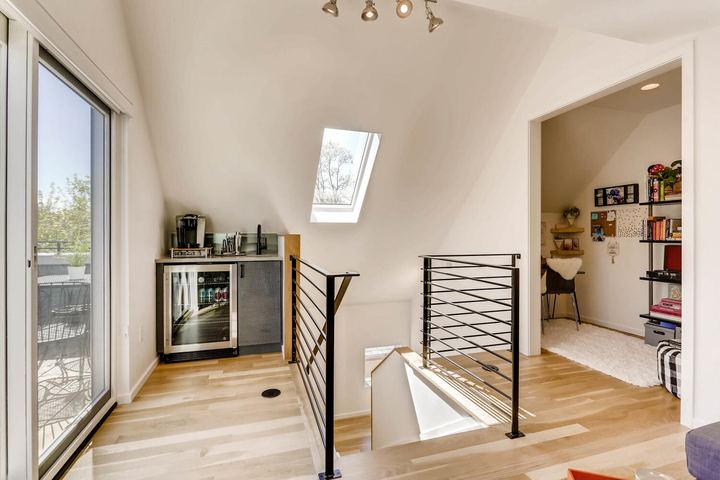 3rd Floor Loft of a Caliber custom home at 1716 W 34th Ave in Denver