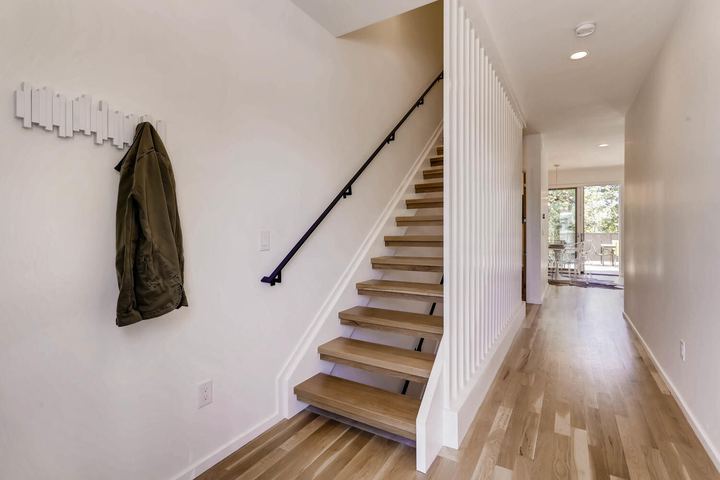 Stairway of a Caliber custom home at 1716 W 34th Ave in Denver