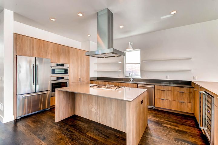 Kitchen of a Caliber custom home at 1803 S Clarkson in Denver