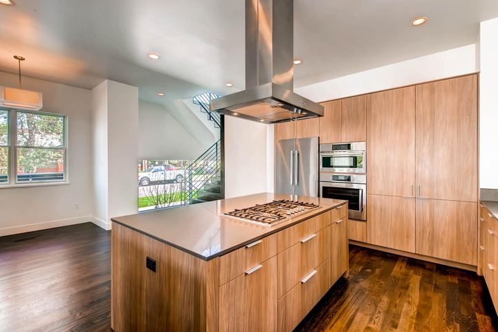 Kitchen of a Caliber custom home at 1803 S Clarkson in Denver