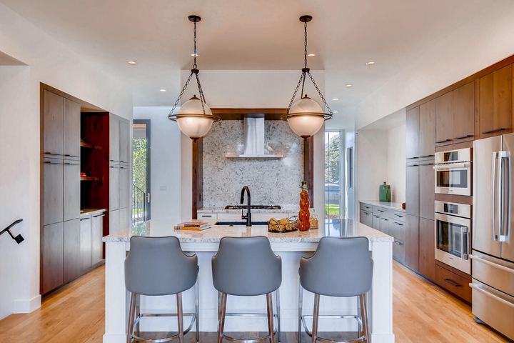 Kitchen of a Caliber custom home at 1923 W 37th Ave in Denver