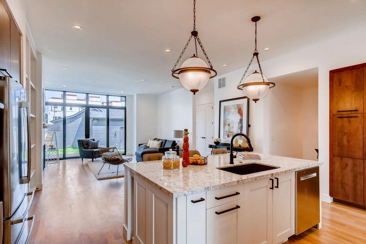 Kitchen of a Caliber custom home at 1923 W 37th Ave in Denver