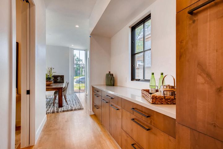 Kitchen of a Caliber custom home at 1923 W 37th Ave in Denver