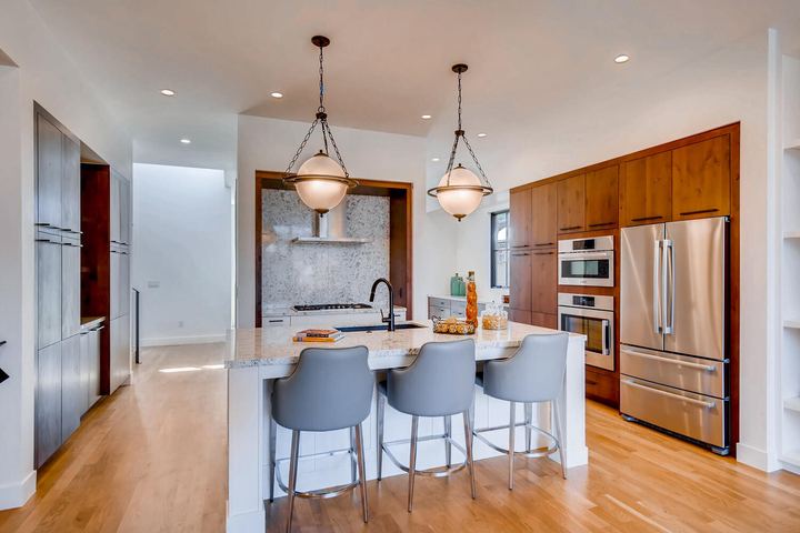 Kitchen of a Caliber custom home at 1923 W 37th Ave in Denver
