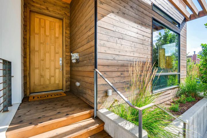 Exterior Front Entry of a Caliber custom home at 2203 W 33rd Ave in Denver