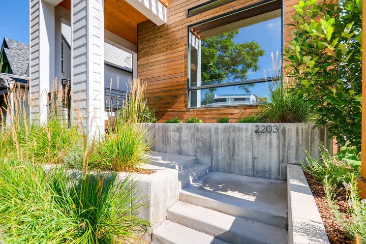 Exterior Front Entry of a Caliber custom home at 2203 W 33rd Ave in Denver