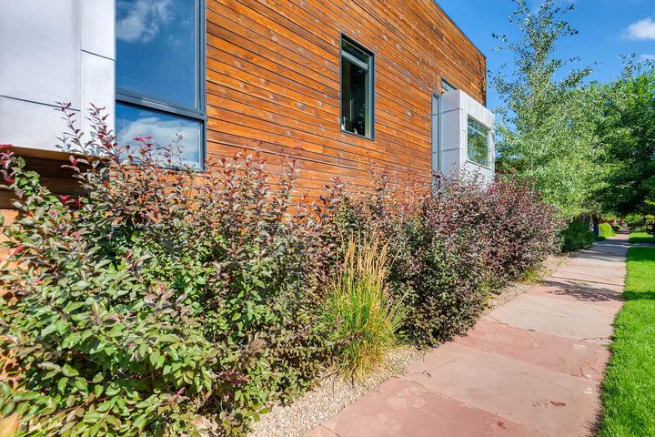 Exterior Side of a Caliber custom home at 2203 W 33rd Ave in Denver