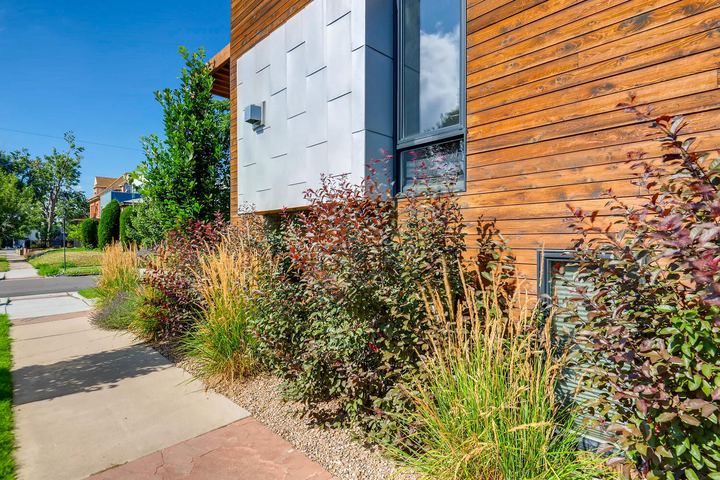 Exterior Side of a Caliber custom home at 2203 W 33rd Ave in Denver
