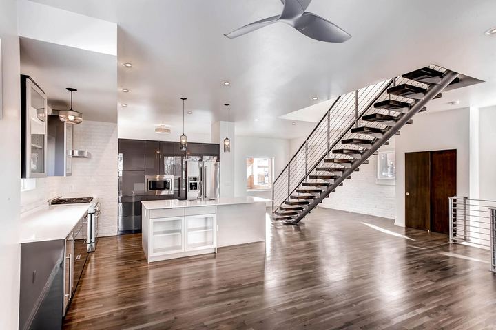Kitchen of a Caliber custom home at 2329 W 32nd Ave in Denver