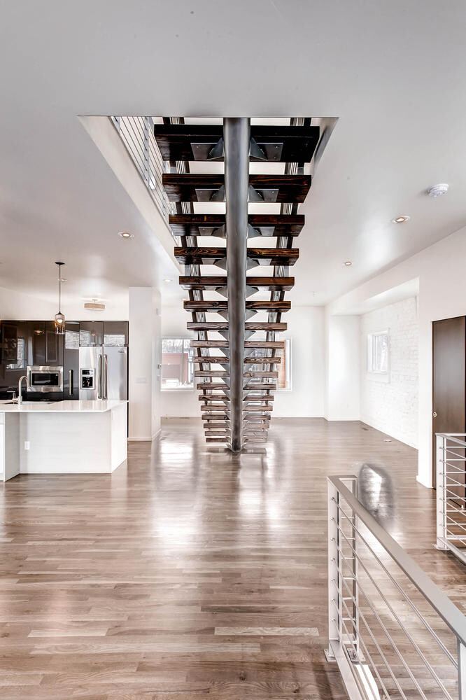 Stairway of a Caliber custom home at 2329 W 32nd Ave in Denver