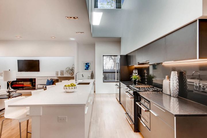Kitchen of a Caliber custom home at 2675 Meade St in Denver