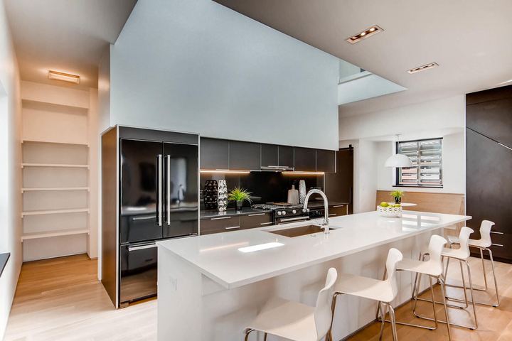 Kitchen of a Caliber custom home at 2675 Meade St in Denver
