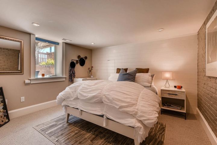 Lower Level Bedroom of a Caliber custom home at 532 N High St in Denver
