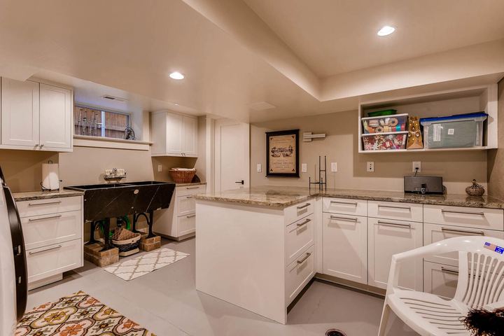 Lower Level Laundry Room of a Caliber custom home at 532 N High St in Denver