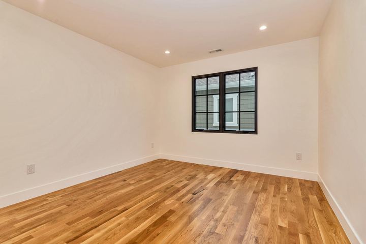 Bedroom of a Caliber custom home at 610 S Race St in Denver