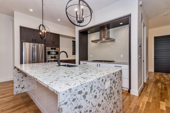 Kitchen of a Caliber custom home at 610 S Race St in Denver