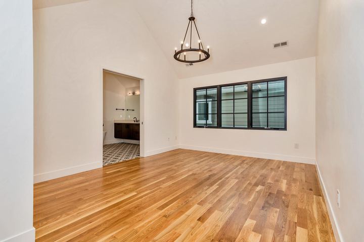 Master Bedroom of a Caliber custom home at 610 S Race St in Denver